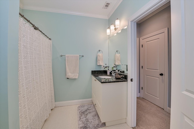 2084 Egret Cir, Evans, GA 30809 - bathroom with vanity, crown molding, and baseboards