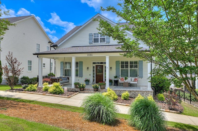 2084 Egret Cir, Evans, GA 30809 - view of front of home featuring a porch and roof with shingles