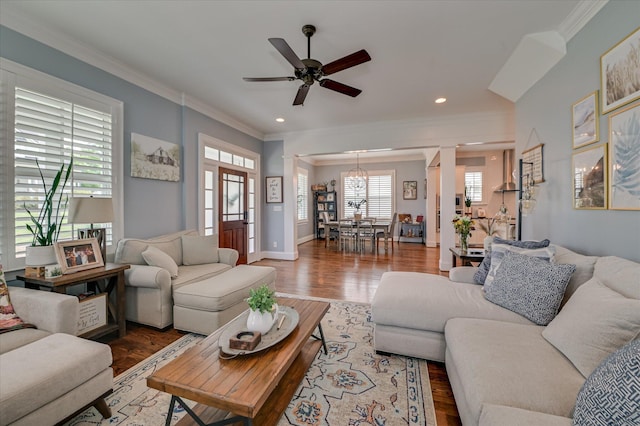 2084 Egret Cir, Evans, GA 30809 - living area featuring crown molding, a ceiling fan, wood finished floors, recessed lighting, and ornate columns