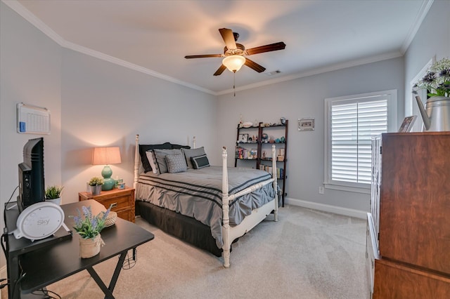 2084 Egret Cir, Evans, GA 30809 - bedroom with crown molding, light carpet, baseboards, and ceiling fan