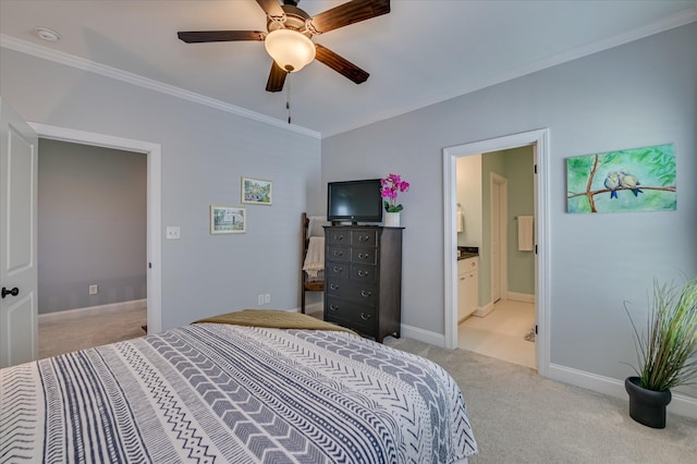 2084 Egret Cir, Evans, GA 30809 - bedroom with light carpet, crown molding, baseboards, connected bathroom, and ceiling fan