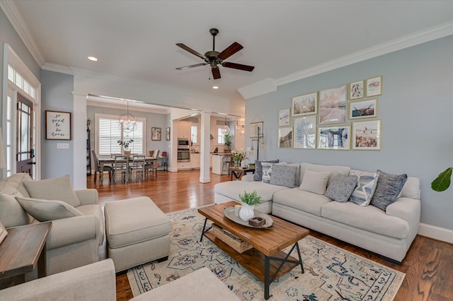 2084 Egret Cir, Evans, GA 30809 - living area with ornamental molding, a ceiling fan, wood finished floors, decorative columns, and recessed lighting