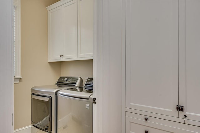 721 Bishops Cir, Evans, GA 30809 - clothes washing area with cabinets and washing machine and dryer