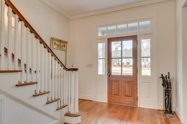 721 Bishops Cir, Evans, GA 30809 - foyer featuring ornamental molding and light hardwood / wood-style flooring