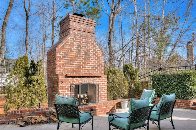 721 Bishops Cir, Evans, GA 30809 - view of patio featuring an outdoor brick fireplace