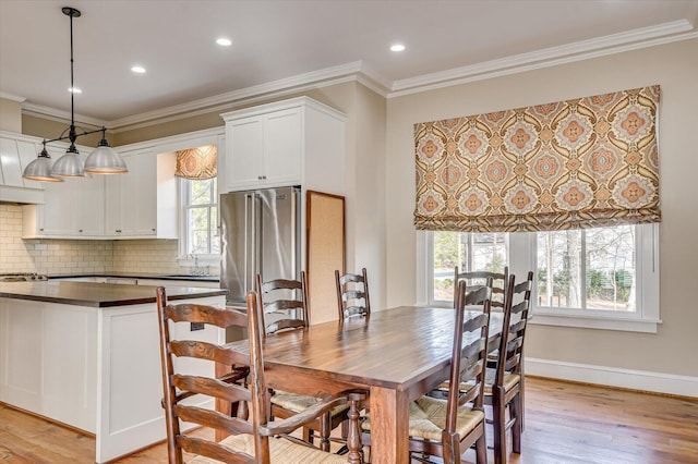 721 Bishops Cir, Evans, GA 30809 - dining area with sink, light hardwood / wood-style flooring, and ornamental molding