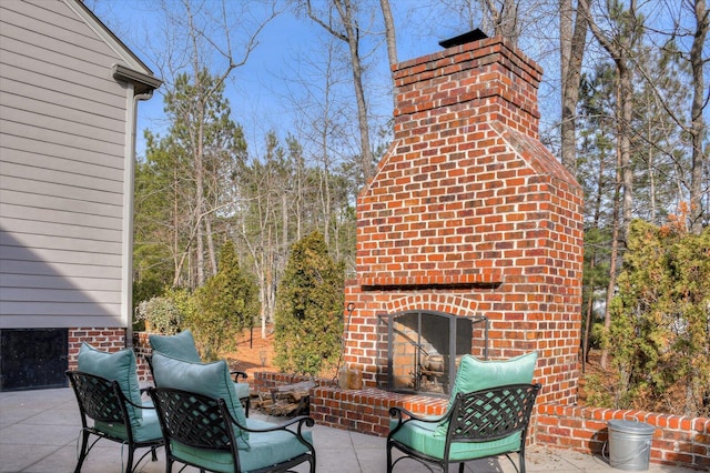 721 Bishops Cir, Evans, GA 30809 - view of patio / terrace with an outdoor brick fireplace
