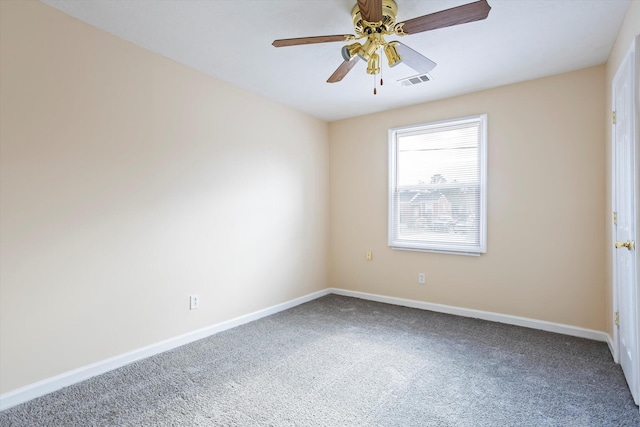 unfurnished room with ceiling fan and carpet flooring