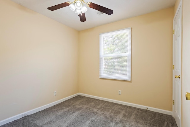 empty room featuring ceiling fan and carpet flooring