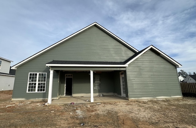 rear view of property featuring a patio area