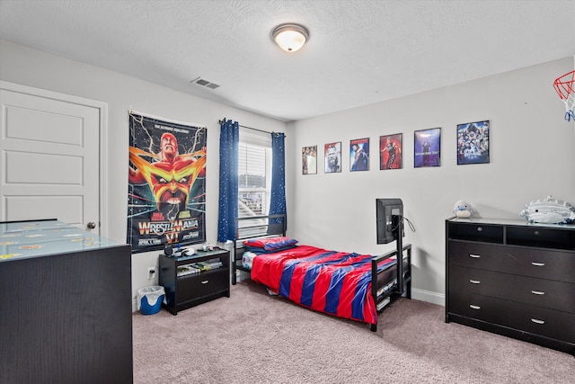 604 Garland Trl, Harlem, GA 30814 - bedroom with a textured ceiling, carpet, and visible vents