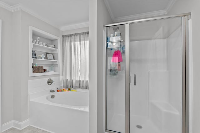 604 Garland Trl, Harlem, GA 30814 - bathroom with a bath, baseboards, a shower stall, and crown molding