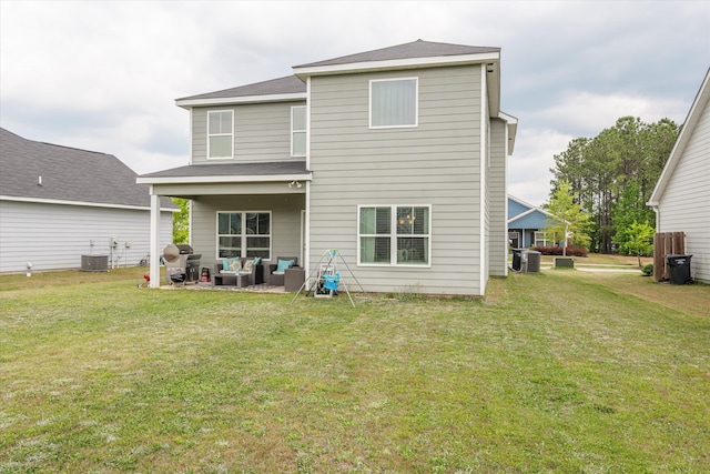 604 Garland Trl, Harlem, GA 30814 - rear view of house with a yard, an outdoor hangout area, central AC, and a patio