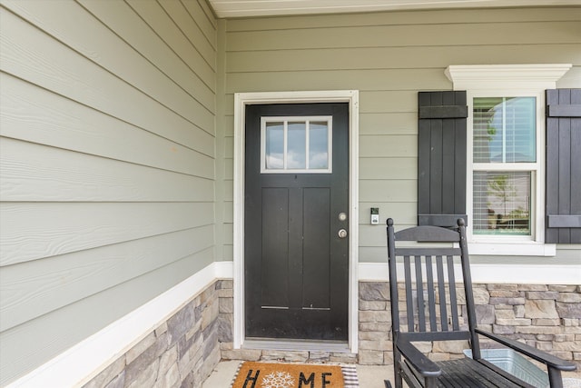 604 Garland Trl, Harlem, GA 30814 - view of exterior entry featuring stone siding