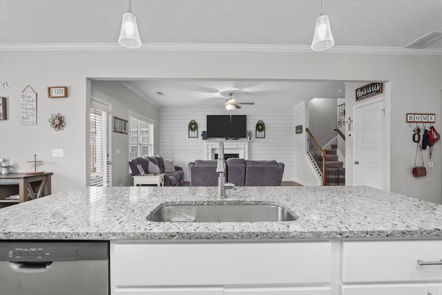 604 Garland Trl, Harlem, GA 30814 - kitchen featuring a fireplace, white cabinetry, stainless steel dishwasher, and ornamental molding