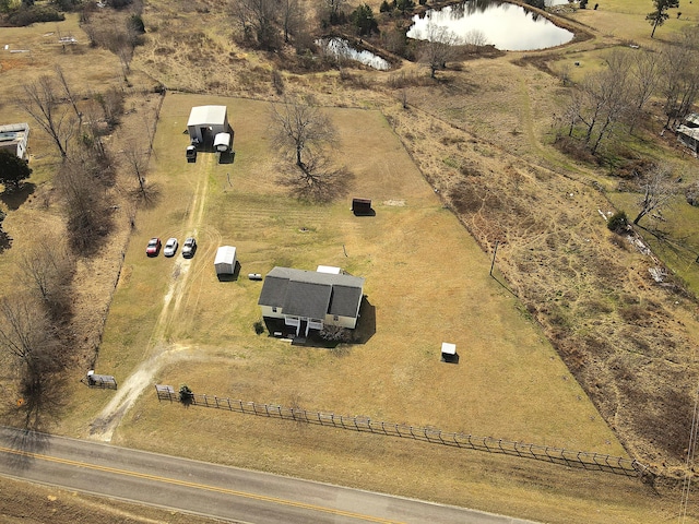 birds eye view of property featuring a rural view