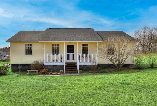 view of front of home featuring roof with shingles, a porch, crawl space, and a front lawn