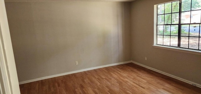 3504 Dayton St, Augusta, GA 30906 - empty room featuring baseboards, plenty of natural light, and wood finished floors
