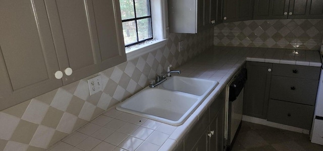 3504 Dayton St, Augusta, GA 30906 - kitchen with a sink, tile counters, and backsplash