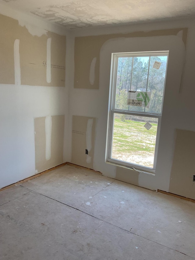 spare room featuring a wealth of natural light