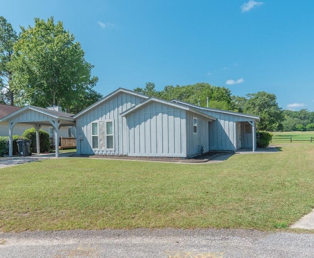 view of home's exterior featuring a yard