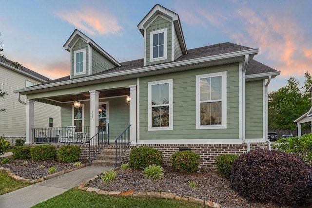 910 Ellis Ln, Evans, GA 30809 - view of front of home with a porch and a shingled roof