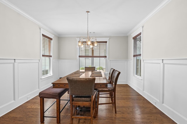 910 Ellis Ln, Evans, GA 30809 - dining space with a decorative wall, a wainscoted wall, dark wood finished floors, a chandelier, and crown molding