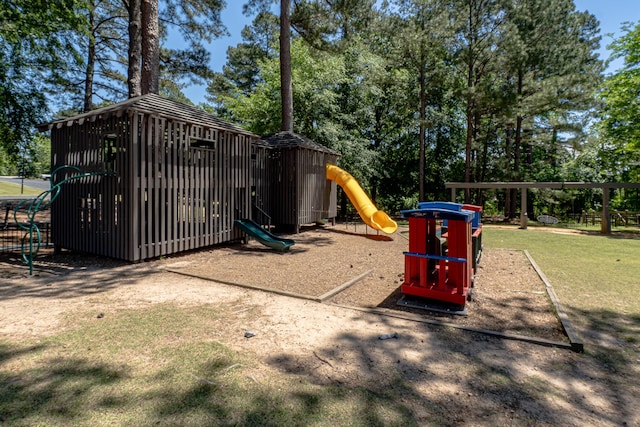 910 Ellis Ln, Evans, GA 30809 - community jungle gym featuring view of wooded area and a yard