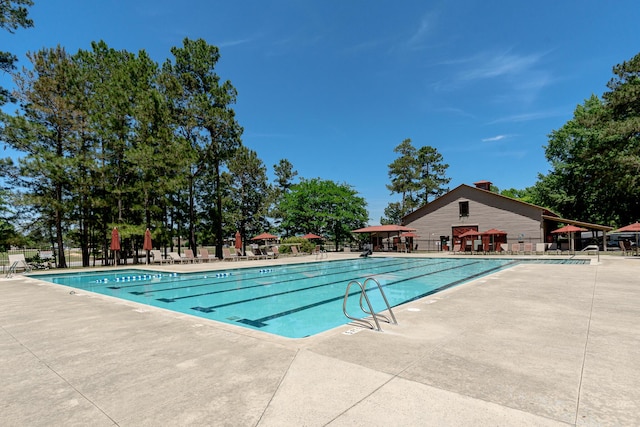 910 Ellis Ln, Evans, GA 30809 - community pool with a patio and fence