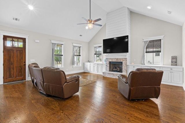 910 Ellis Ln, Evans, GA 30809 - living room with high vaulted ceiling, a ceiling fan, a brick fireplace, wood finished floors, and recessed lighting