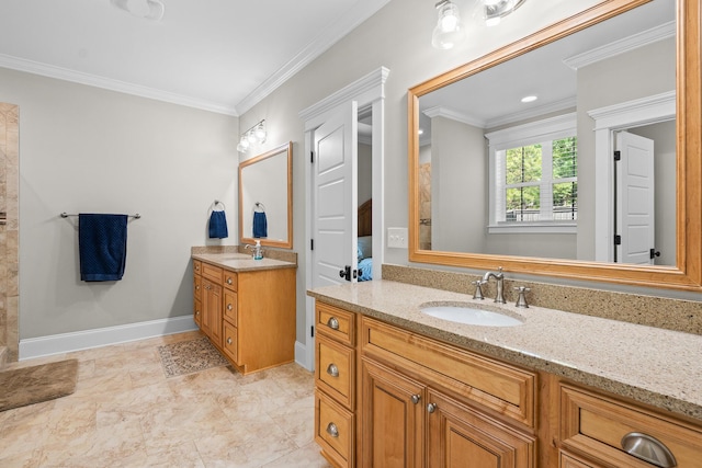 910 Ellis Ln, Evans, GA 30809 - bathroom featuring two vanities, crown molding, and baseboards