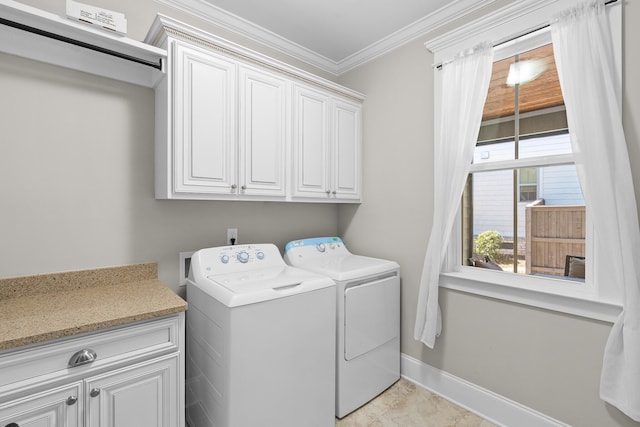910 Ellis Ln, Evans, GA 30809 - laundry area with cabinet space, independent washer and dryer, ornamental molding, and baseboards