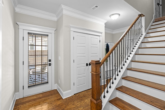 910 Ellis Ln, Evans, GA 30809 - foyer entrance featuring ornamental molding, wood finished floors, stairs, and baseboards
