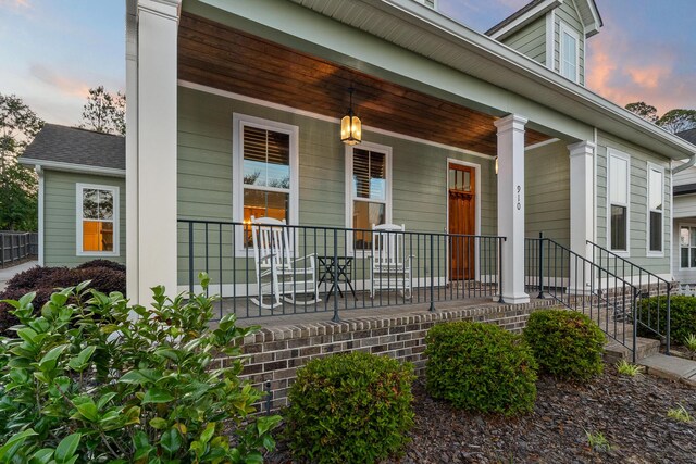 910 Ellis Ln, Evans, GA 30809 - doorway to property featuring a porch