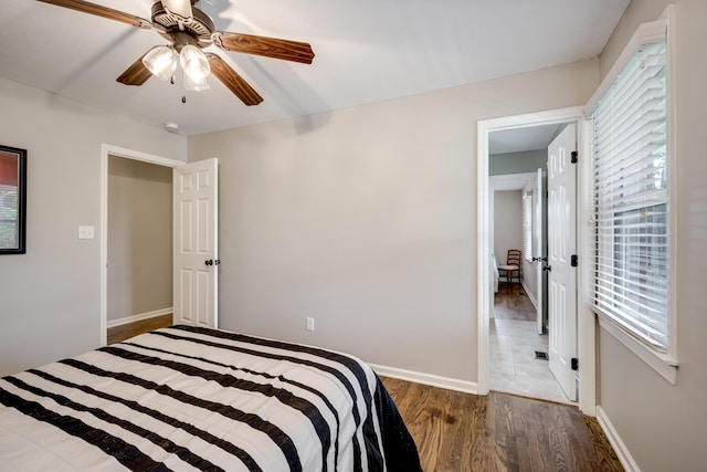 621 Cambridge Rd, Augusta, GA 30909 - bedroom featuring wood finished floors, multiple windows, and ceiling fan