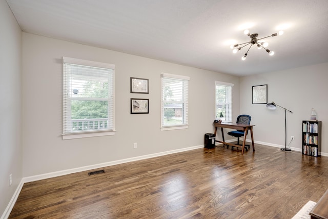 621 Cambridge Rd, Augusta, GA 30909 - misc room with a chandelier, dark wood-style floors, and a desk