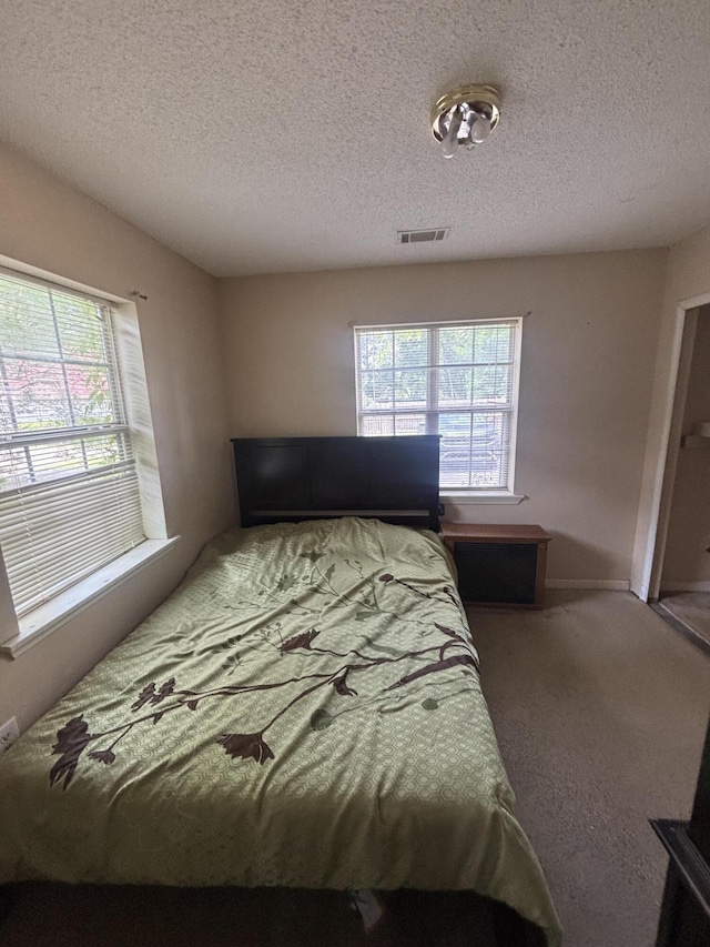 1405 E Thorpe Ln, Aiken, SC 29801 - bedroom featuring carpet flooring and a textured ceiling