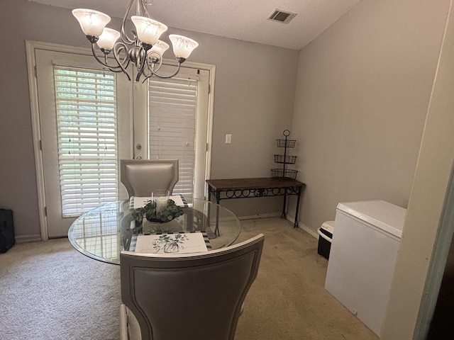 1405 E Thorpe Ln, Aiken, SC 29801 - dining space with light carpet, a chandelier, and baseboards