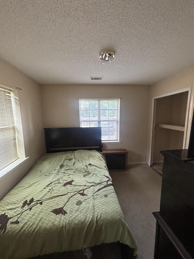 1405 E Thorpe Ln, Aiken, SC 29801 - carpeted bedroom with a textured ceiling