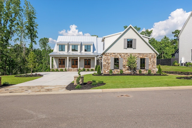 811 Audubon Way, Evans, GA 30809 - view of front of house featuring a porch, a front lawn, stone siding, and concrete driveway