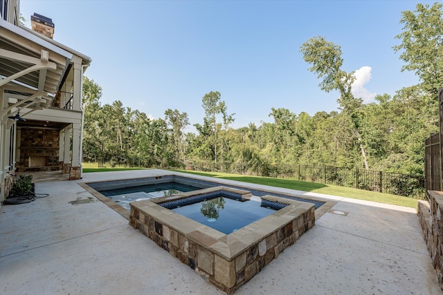 811 Audubon Way, Evans, GA 30809 - view of swimming pool featuring an in-ground hot tub, a patio, and a wooded view