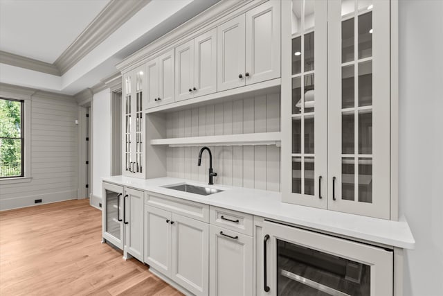 811 Audubon Way, Evans, GA 30809 - bar area with wine cooler, ornamental molding, and light wood finished floors