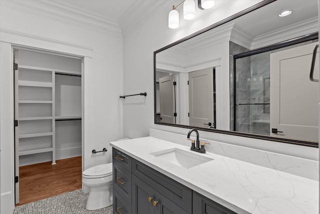 811 Audubon Way, Evans, GA 30809 - full bathroom featuring vanity, a stall shower, crown molding, and wood finished floors