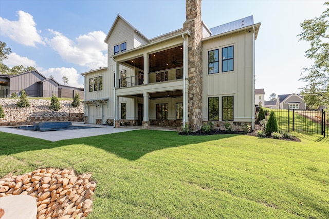 811 Audubon Way, Evans, GA 30809 - back of house featuring a balcony, board and batten siding, ceiling fan, a patio, and stone siding