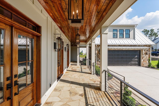 811 Audubon Way, Evans, GA 30809 - porch featuring driveway and an attached garage