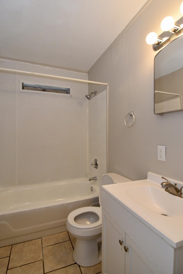 full bathroom featuring tile patterned floors, vanity, toilet, and tub / shower combination