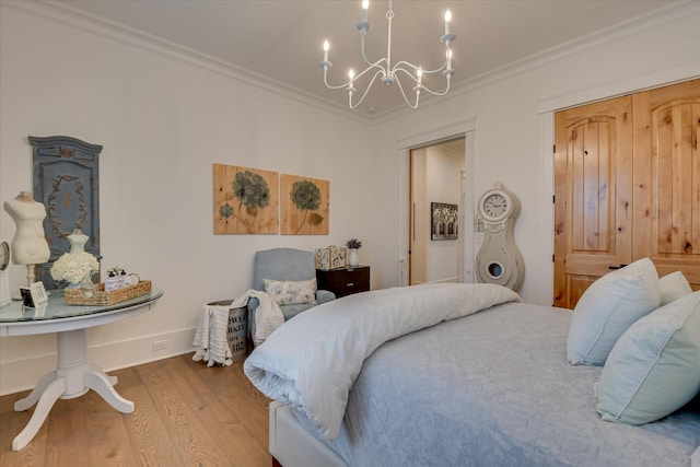 3121 Carillon Way, Evans, GA 30809 - bedroom featuring a chandelier, wood finished floors, and crown molding
