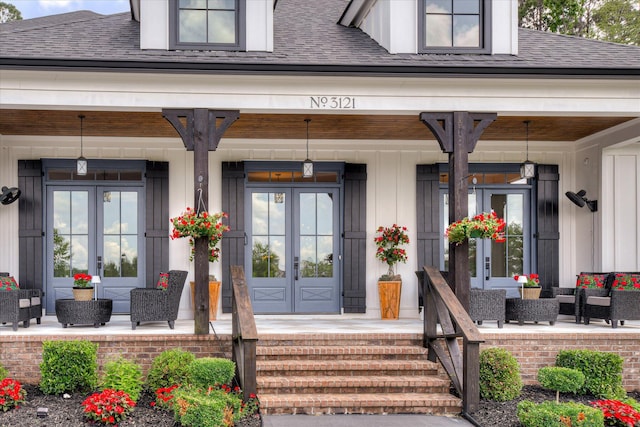 3121 Carillon Way, Evans, GA 30809 - doorway to property featuring a porch, french doors, and board and batten siding