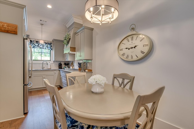 3121 Carillon Way, Evans, GA 30809 - dining room with a chandelier, wood finished floors, and recessed lighting