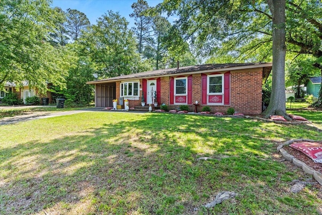 ranch-style house with driveway, brick siding, a front yard, and an attached carport